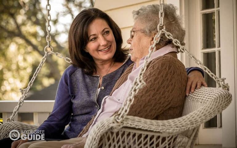 psychologist talking to an elderly woman