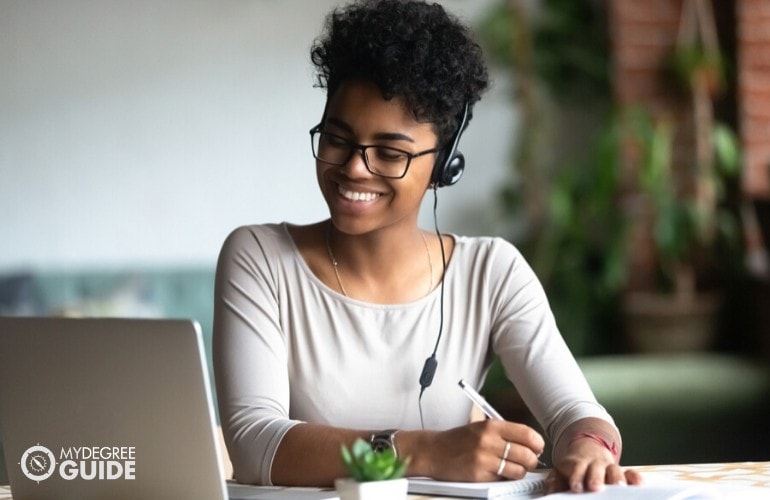 accounting student studying on her laptop