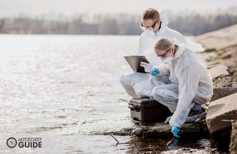 biologists working together on water analysis