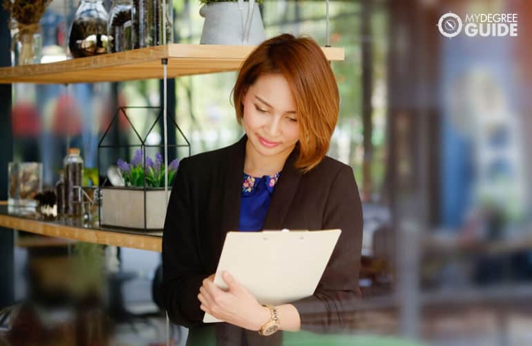 female employee with a checklist