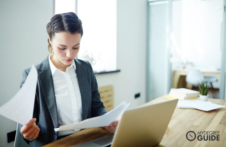 accountant reviewing some accounting documents