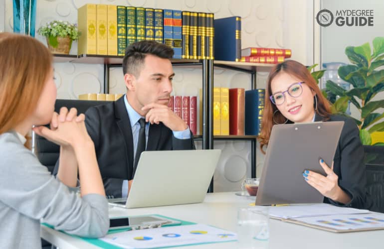 chief financial officer sees financial summary reports with his team