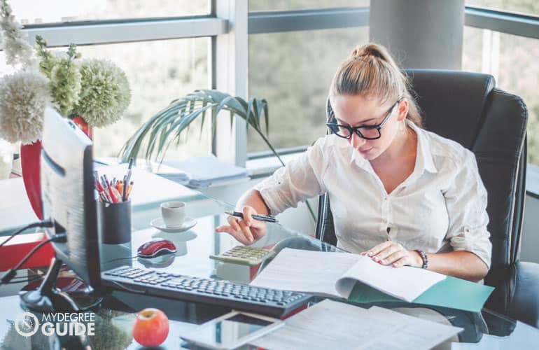 accounting associate working in an office