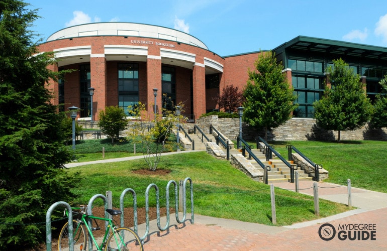 professionals touring a campus