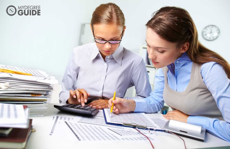 two female accountants working in the office