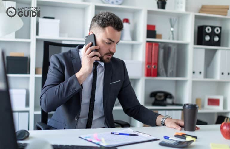 accountant talking to a client on the phone