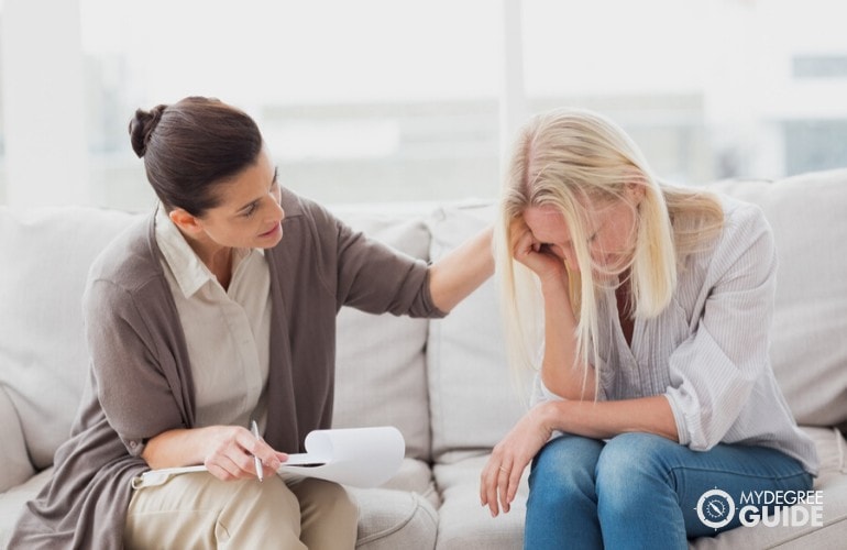 counselor talking to a patient in her office