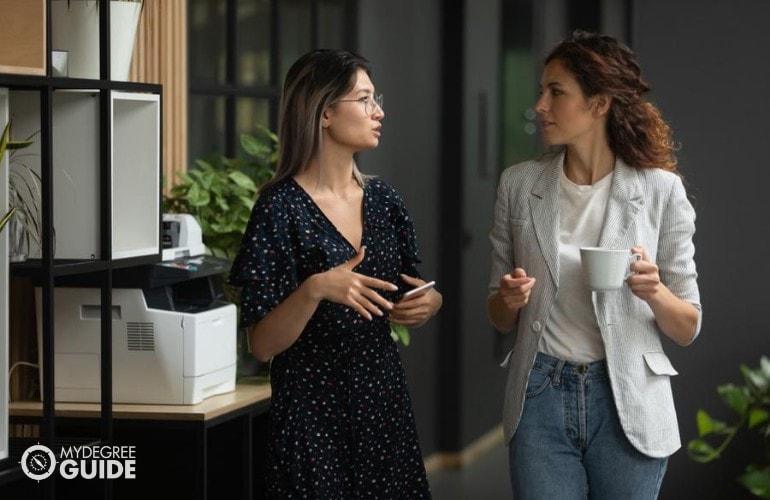 professionals chatting outside a clinic