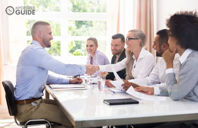 admissions committee interviewing a phd student applicant