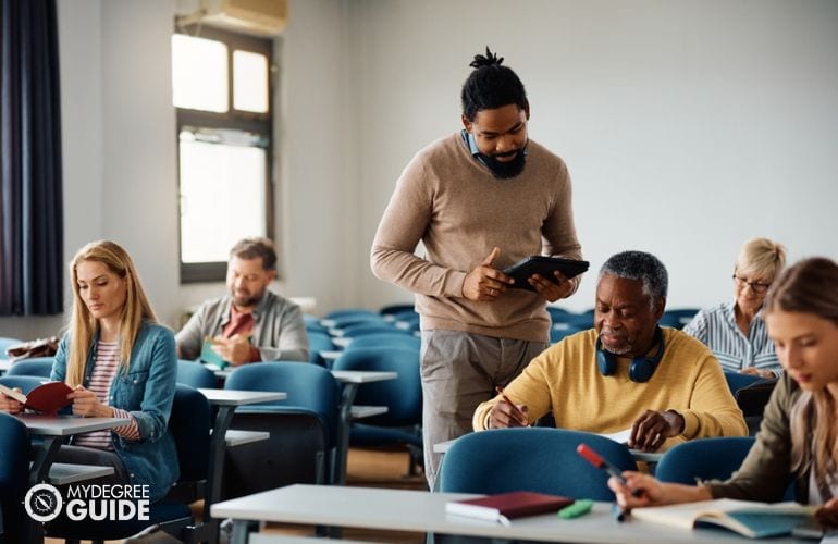 professor teaching doctorate of education student