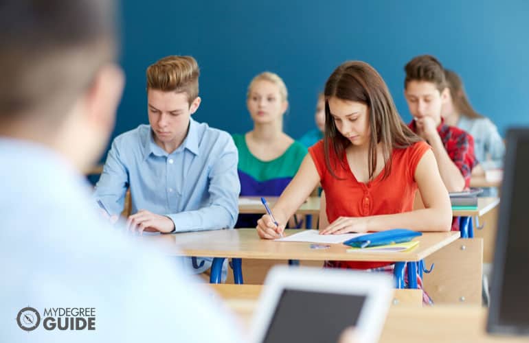 high school students taking a test