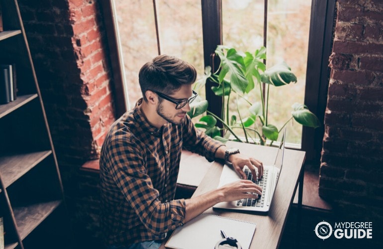 IT student studying at home