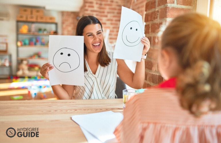 Behavioral Psychologist with a child during therapy