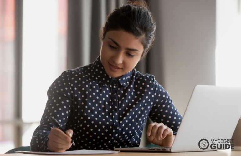 accountant working on her laptop