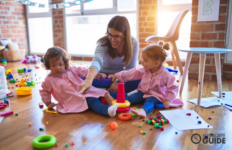 preschool teacher teaching kids