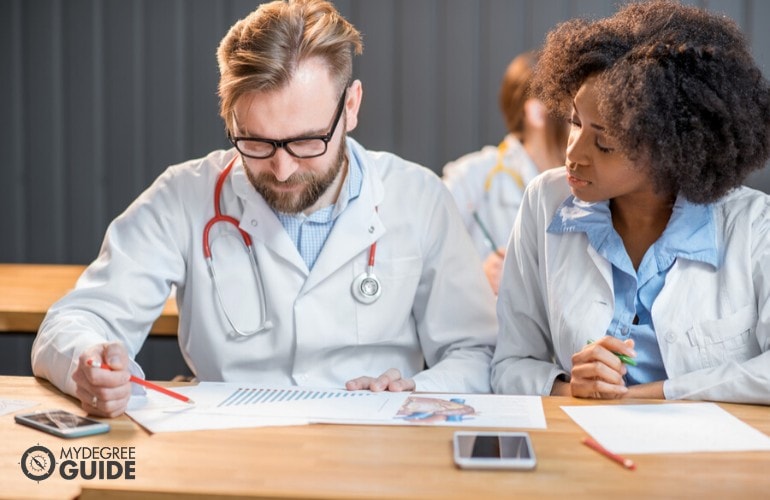 Associates in Health Information Technology Degree students studying in class