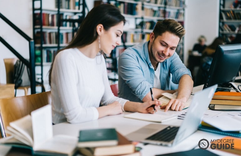 liberal arts degree students studying in library