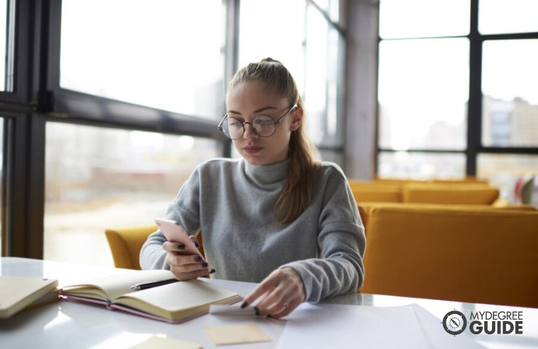 liberal arts degree student studying in university library