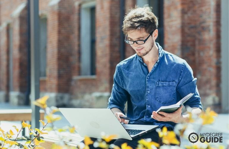 Man taking Associates in Psychology Degree Online