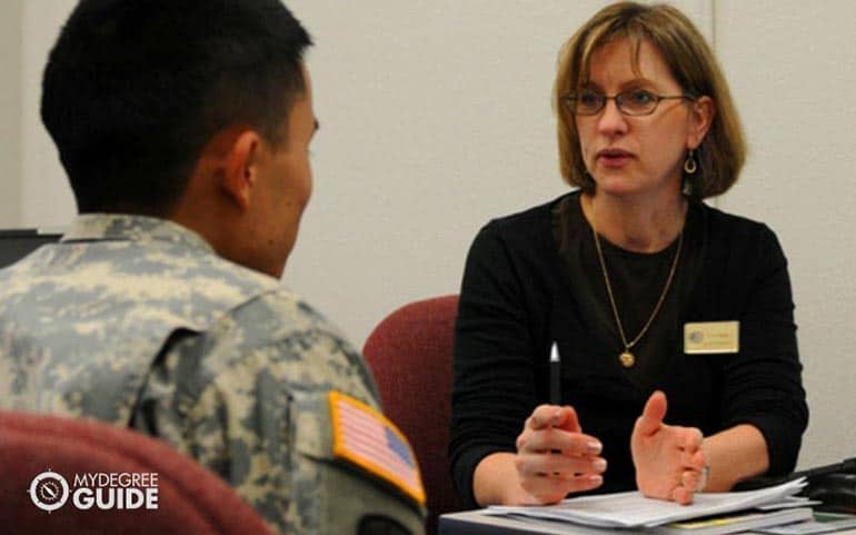 psychologist in session with a military personnel
