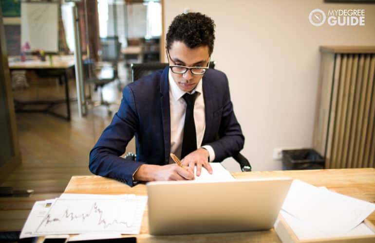 male economist working in the office