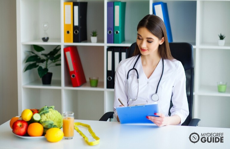 nutritionist working in her office