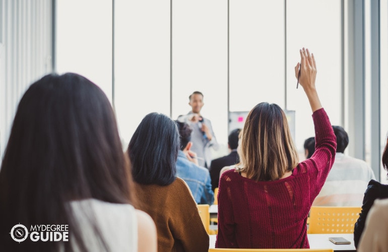 people participating in a classroom