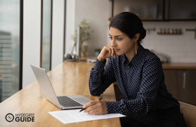 Woman preparing requirements for Bachelor's in Health Education