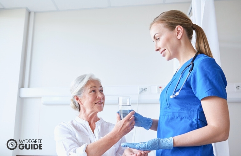 nurse taking care of her patient