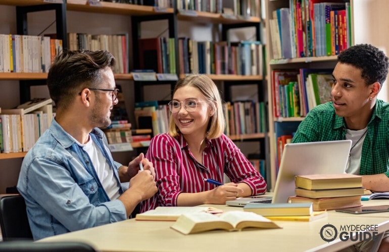 college students studying together in libray