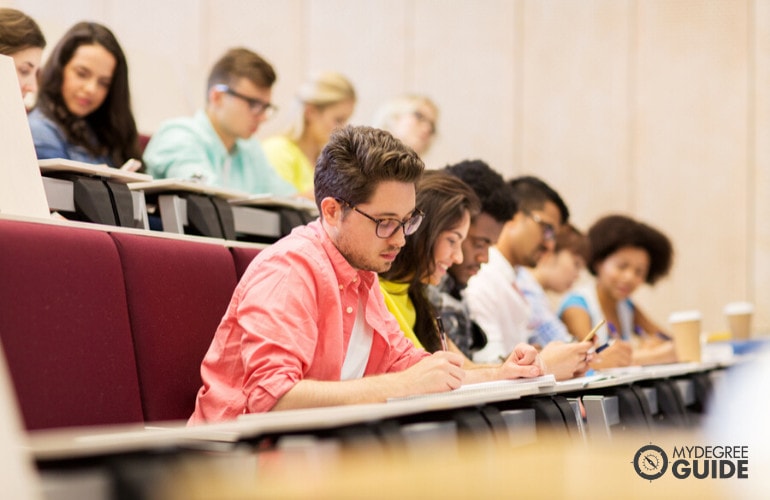 Applied Behavior Analysis students listening to a lecture in a university classroom