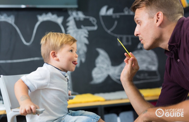 Speech Pathologist with child