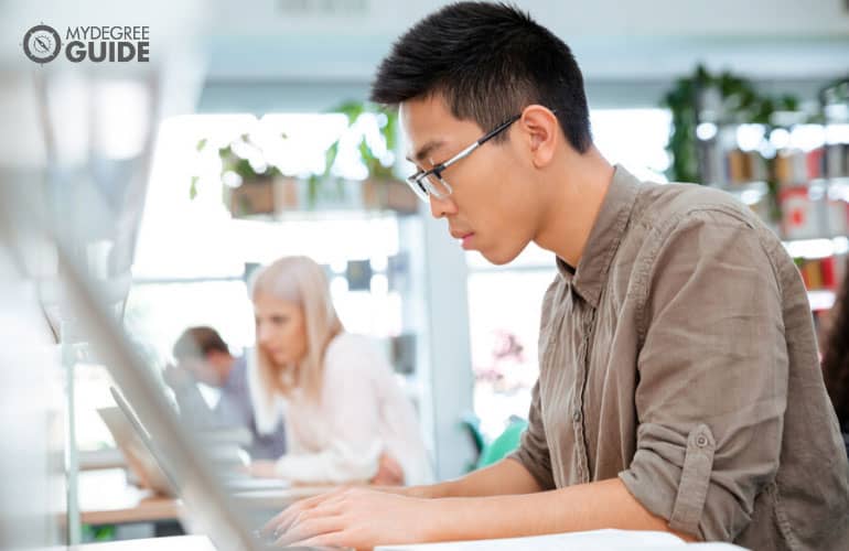 english degree student studying in university library