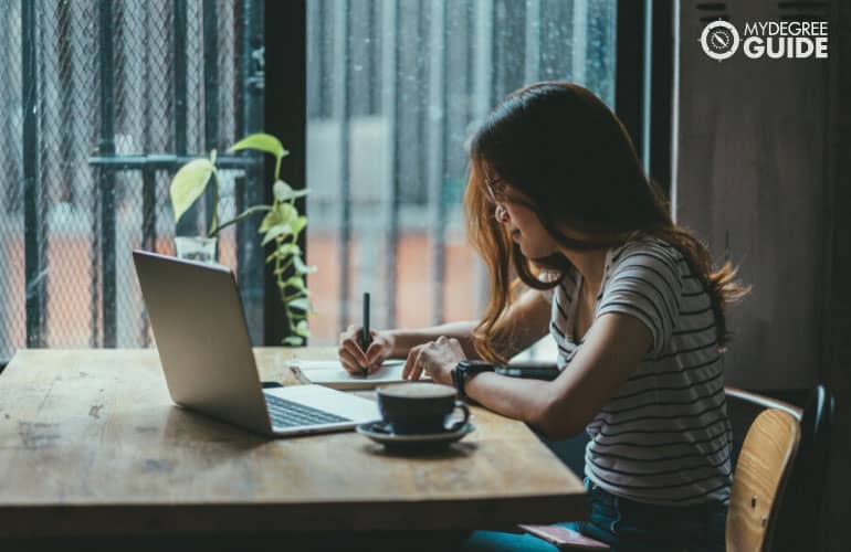 student studying on her computer