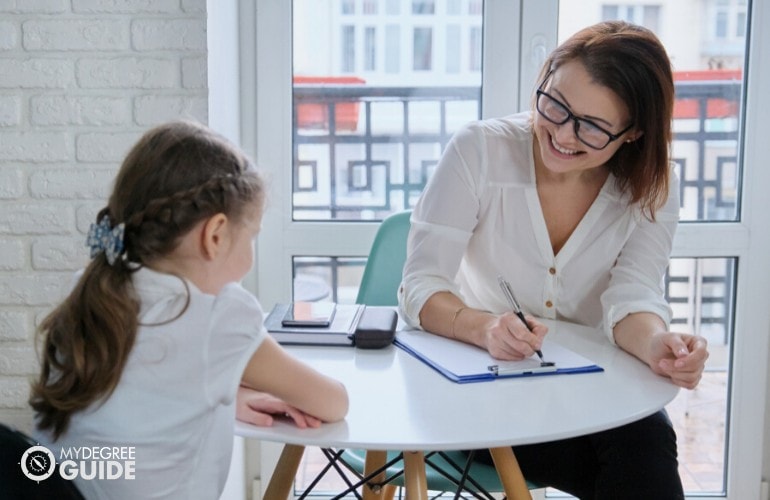 Social Worker talking to a child