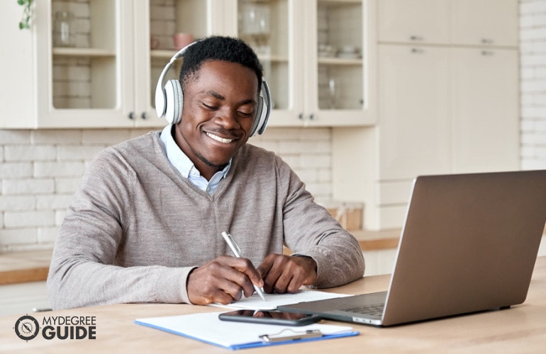 computer science student studying at home