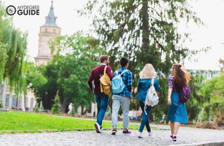 students walking across campus