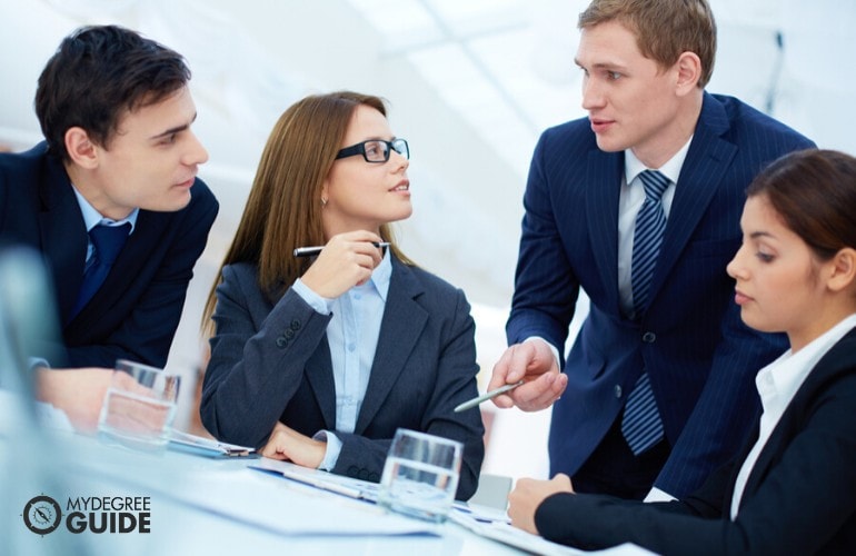 Government Program Managers in a meeting