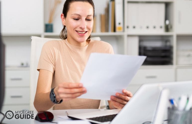 Woman preparing Biotechnology Masters requirements