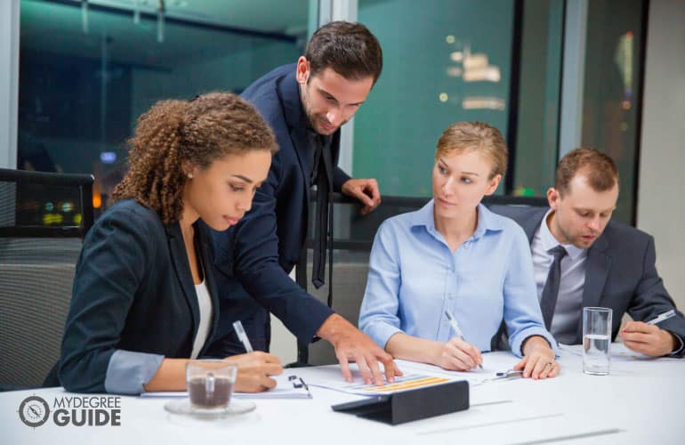 business employees discussing a project