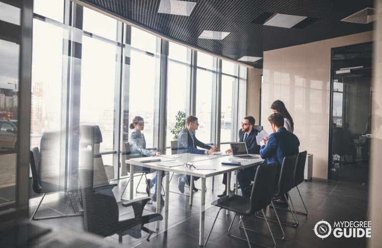 professionals having a meeting in an office