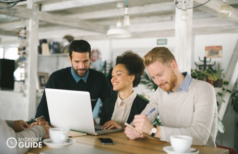 business administrators working together in modern office