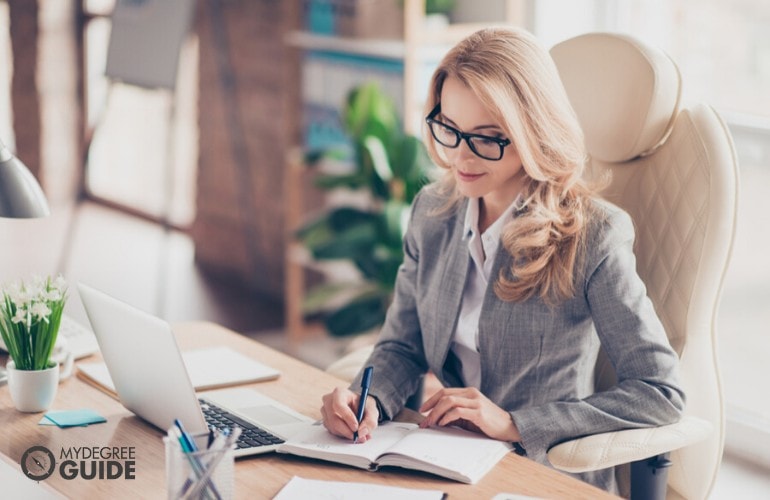 business administrator working in her office