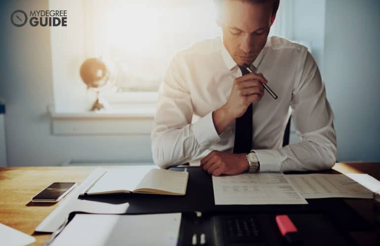 male businessman reviewing financial statements