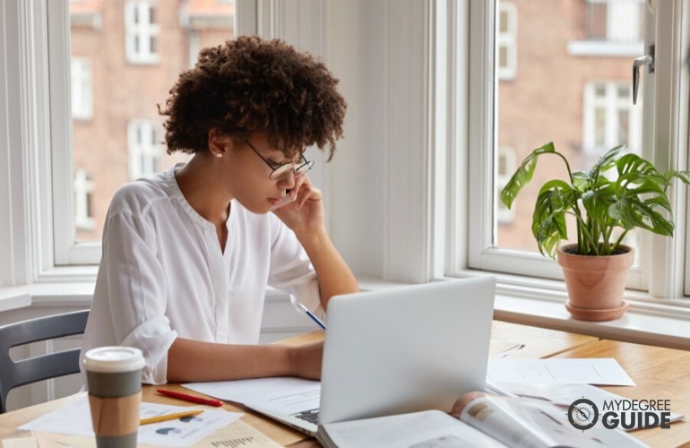 business degree student studying in her office