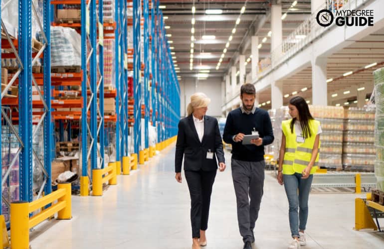 Business Operations Manager visiting a warehouse