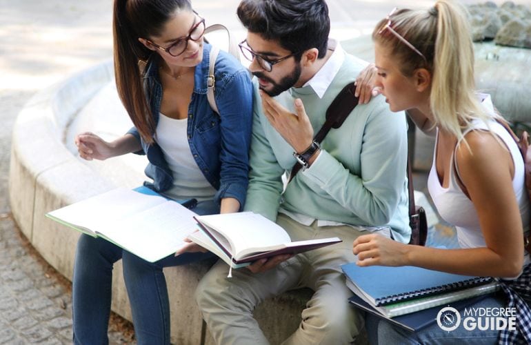 college friends meeting in school campus