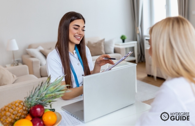 Dietician in a follow-up session with her client