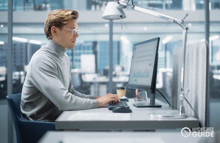 Hospital's Financial Manager working in his office