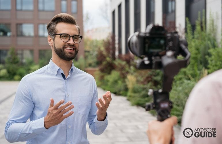 News reporter doing live coverage of an event